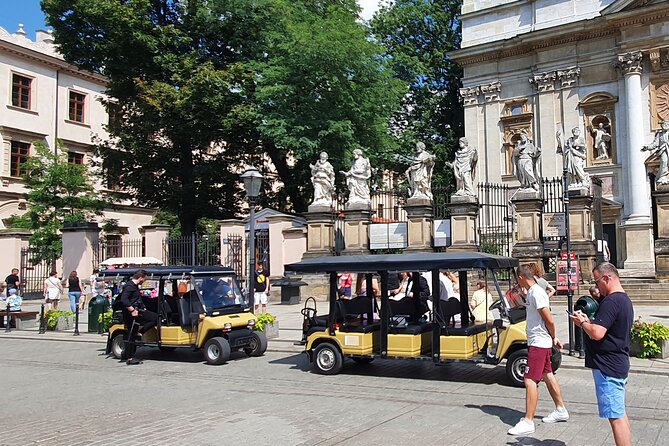 Cracow guided Full tour by Golf Cart-Family Discount - Schindler’s Factory exterior views and the empty chairs memorial