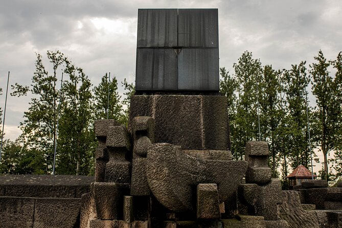 Day Tour to Auschwitz Birkenau Museum with Transportation - Birkenau (Auschwitz II) and the historical gate: the scale hits hardest here