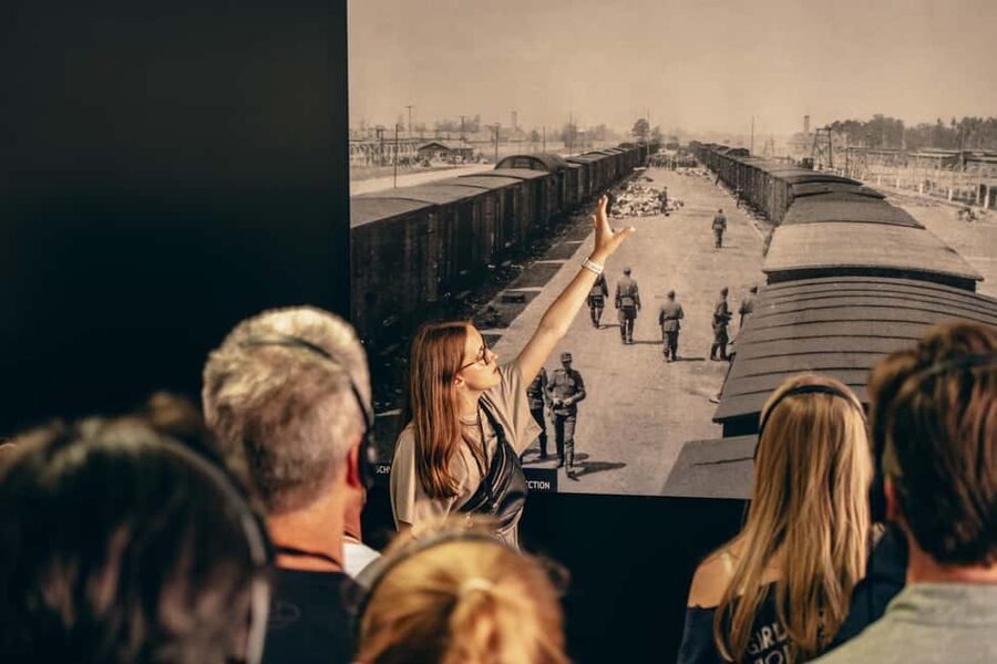 From Krakow: Auschwitz-Birkenau Live Guided Tour & Pickup - Auschwitz II–Birkenau: Railway Tracks, Gas Chambers Remains, and the Scale of Loss