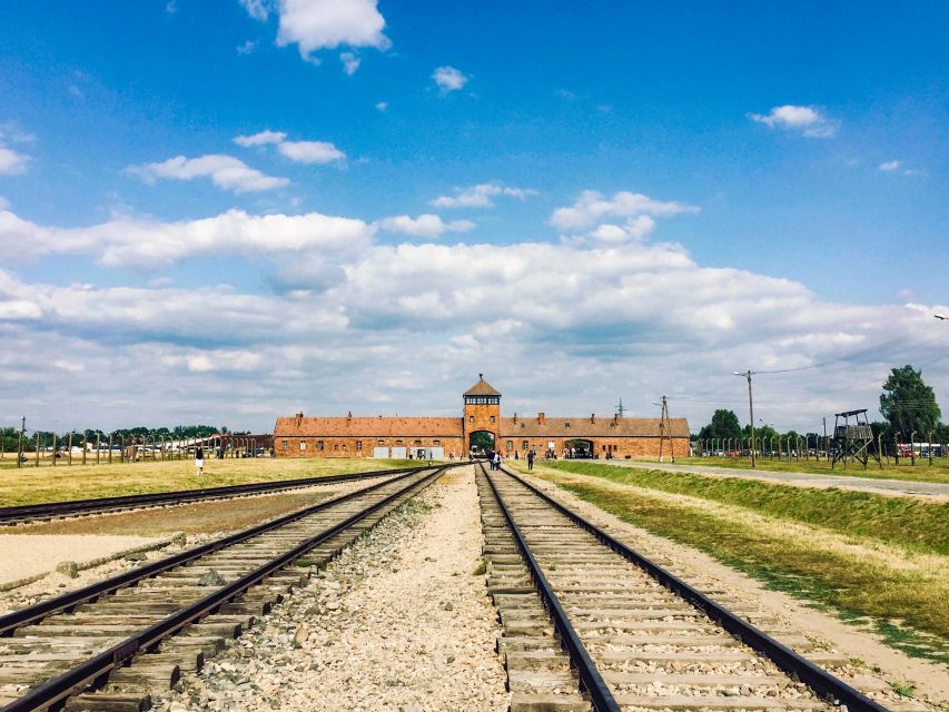 From Krakow: Auschwitz-Birkenau Tour with Transportation - Skip-the-line entry plus booklets: how to get oriented fast