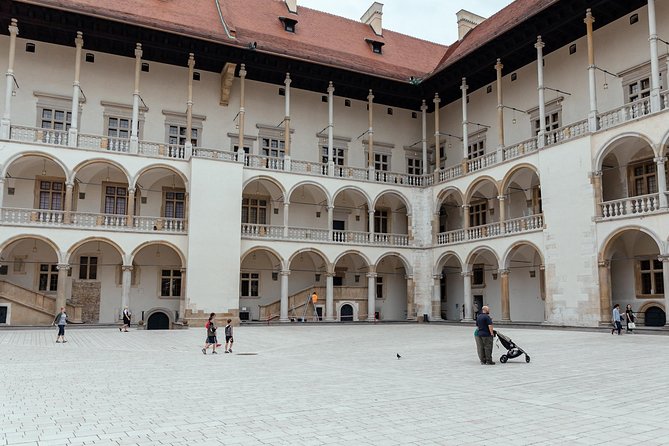 Highlights & Hidden Gems With Locals: Best of Krakow Private Tour - Wawel Royal Castle views from outside, with the dragon story