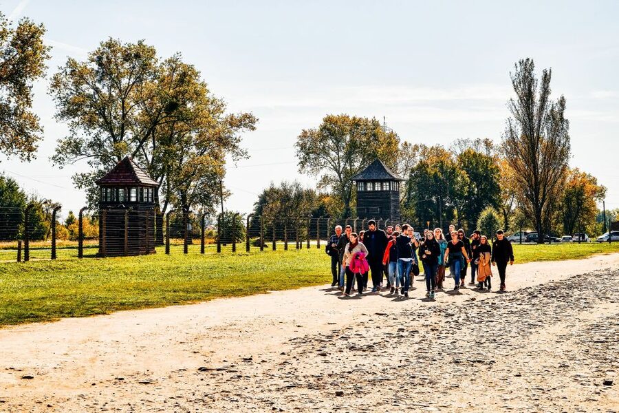 Krakow: Auschwitz-Birkenau Live Guided Tour & Hotel Pickup - The documentary before Auschwitz is not just filler