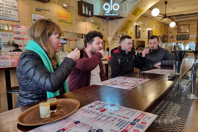 Krakow City Tour on Scooter and Food Tasting with English Guide - Kanonicza Street: the intimate lane between old houses and food stops