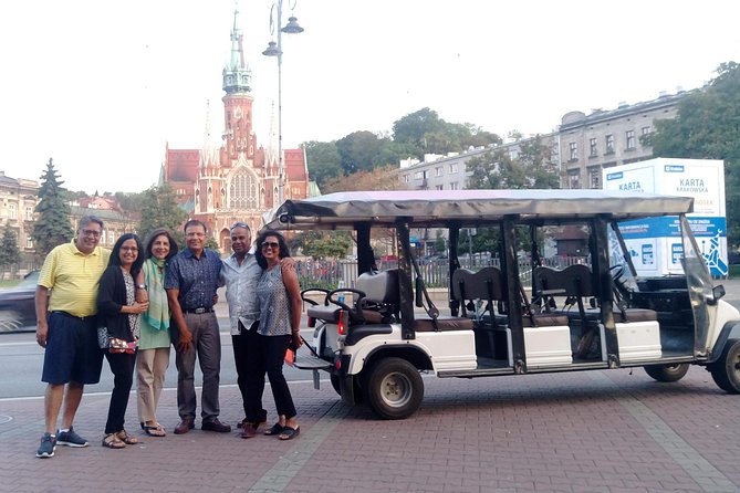 Krakow: Guided City Tour by Golf Buggy (with hotel pickup) - Riding Krakow’s highlights in a heated golf buggy