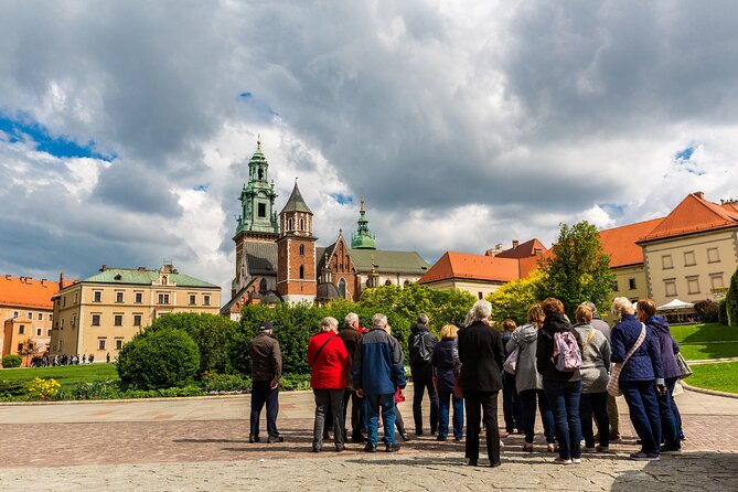 Krakow Guided Tour to Iconic Polish Royal Residence Wawel Castle - Meeting at Kanonicza 25: How to Find Your Group Fast