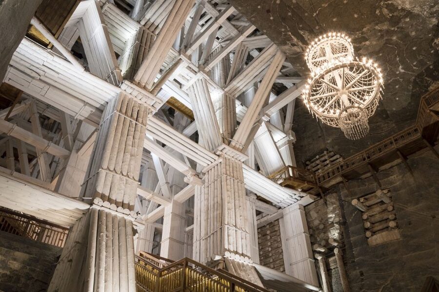 Krakow: Lazy Catamaran River Cruise and Salt Mine Group Tour - The Church of St. Kinga: Chandeliers and Saints Carved Out of Salt