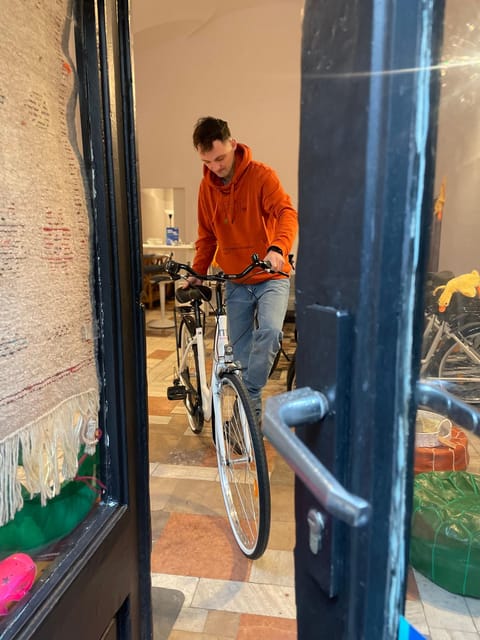 Krakow: Old Town and Kazimierz Guided Bike Tour - Florian Gate, the Barbican, and Main Market Square: your Krakow orientation ladder