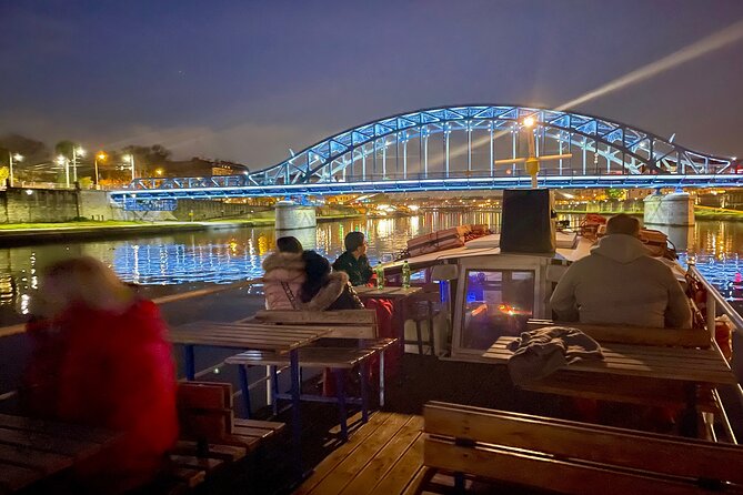 Krakow: One Hour Evening or Night Boat Trip - Wawel Hill after dark: castle, cathedral, and the fire-breathing dragon