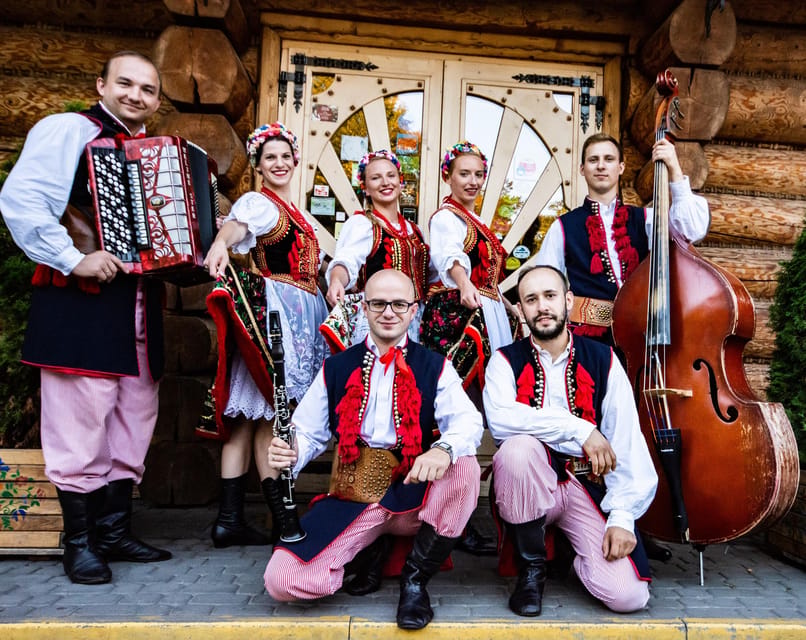 Krakow: Polish Folk Night with Dinner and Unlimited Drinks - The double-decker bus ride: part scenic, part stress test