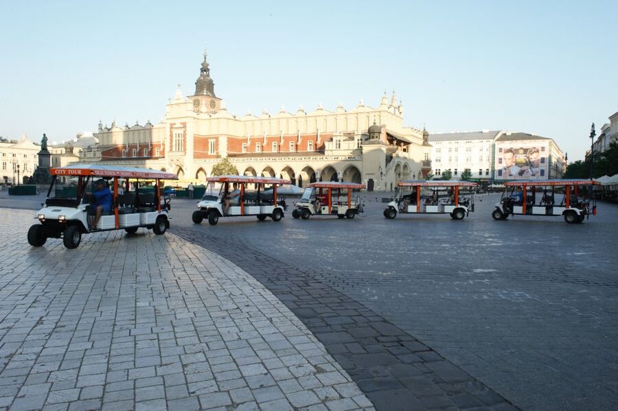 Krakow: Private Sightseeing by Electric Car - Using the multilingual audio guide without getting bored