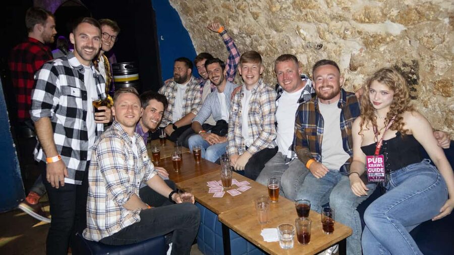 Krakow: Pub Crawl 1H Open Bar, VIP Entry & Welcome Shots - Drinking games and group energy: how this helps you meet people