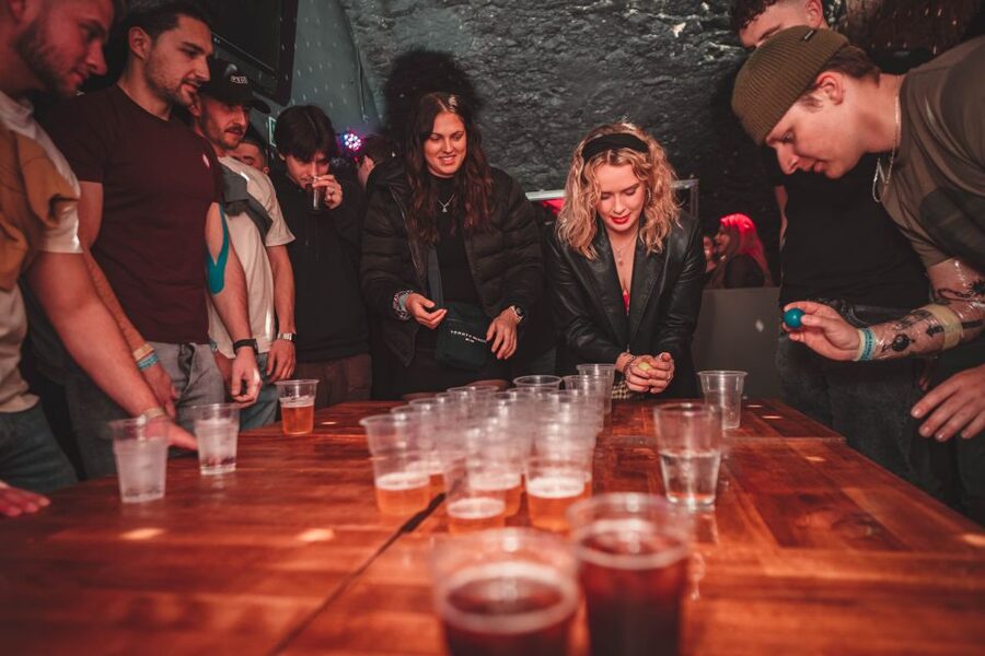 Krakow: Pub Crawl with 1 Hour of Unlimited Alcoholic Drinks - Games, magic, and the photographer: built for memories, not just drinks