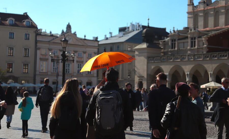 Krakow: The Old Town Walking Tour - Finding the guide at St. Mary’s Basilica with an orange umbrella