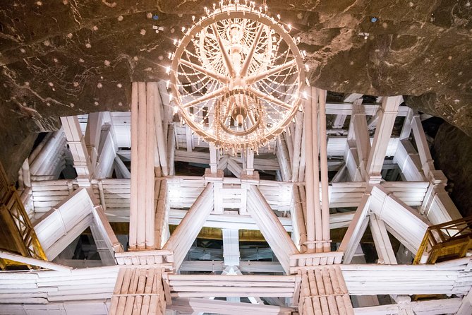 Krakow to Wieliczka: Salt Mine Guided Tour with Ticket & Transfer - Inside the Mine: 64 Meters Down and the Best “First Look” Moments