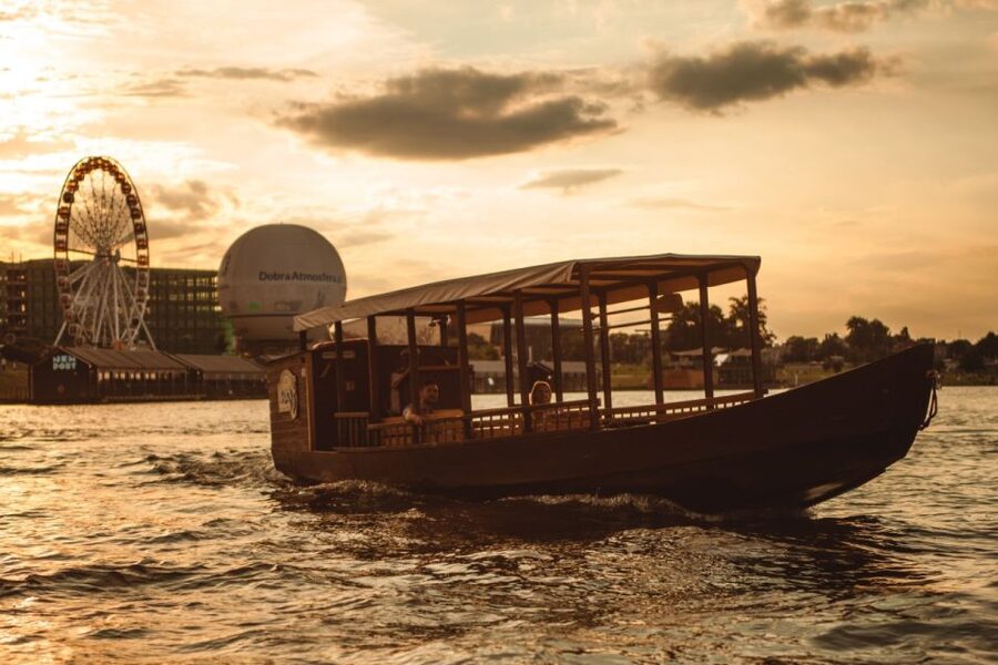 Krakow: Vistula Night Cruise by Gondola w/ Audio Commentary - Meet the wooden boat at Mauretania Barge (and what makes it special)