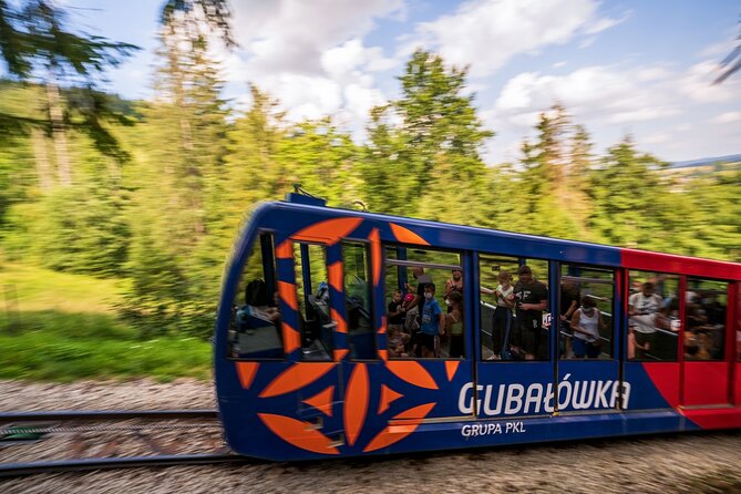 Krakow Zakopane Cable Car Vodka Cheese and Hot Springs Tour - Krupówki Street: where Zakopane shows its everyday side