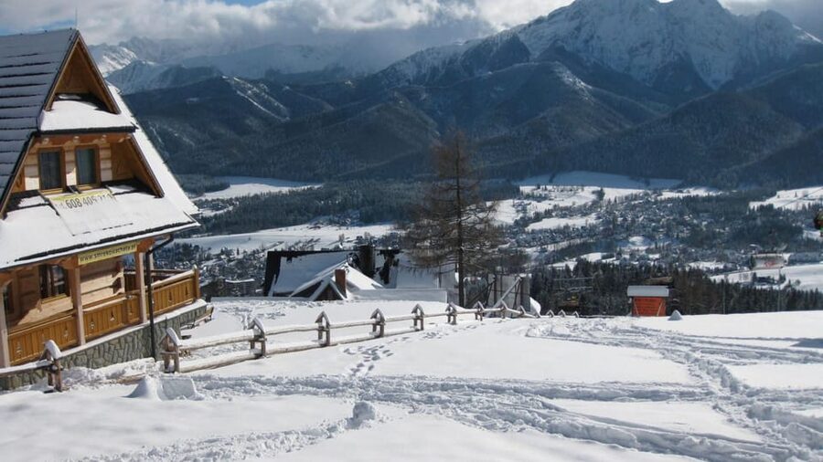 KRAKOW ZAKOPANE TOUR CABLE CAR THERMAL BATHS & HOTEL PICKUP - Zakopane free time: Krupówki Street and Sabała’s oldest house