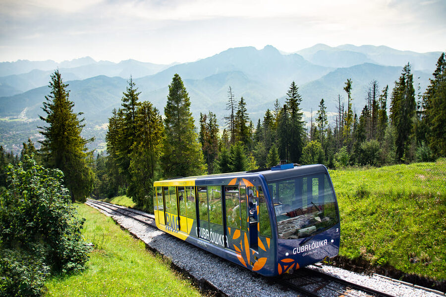 Krakow: Zakopane Tour with Cable Car, Tasting & Hotel Pickup - The drive stop in the Polish mountains: quick photos, real atmosphere
