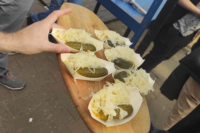 Walking Guided Tour with Street Food in Krakow - Getting the Layout Right: Start and Finish Points